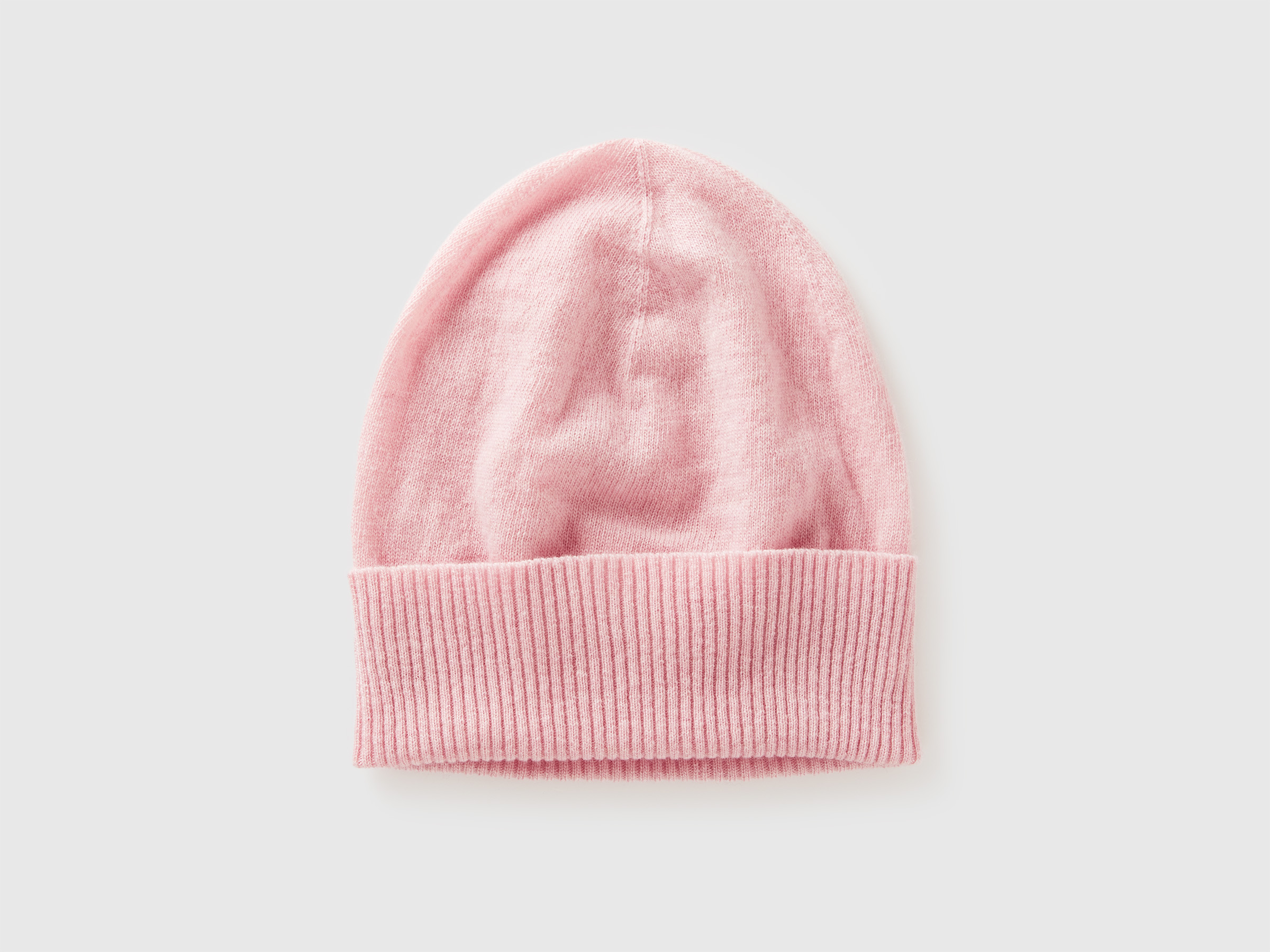 Bonnet rose poudré en pure laine mérinos Bonnet rose poudré en pure laine mérinos