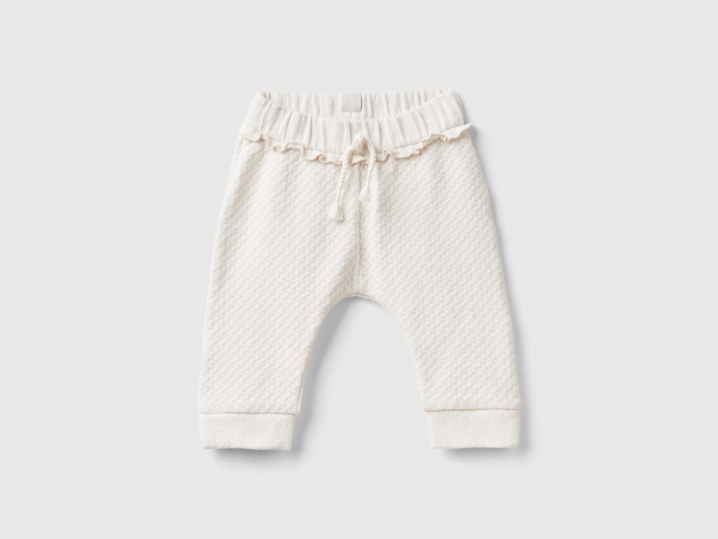 Pantalon en jacquard à petites fentes Pantalon en jacquard à petites fentes