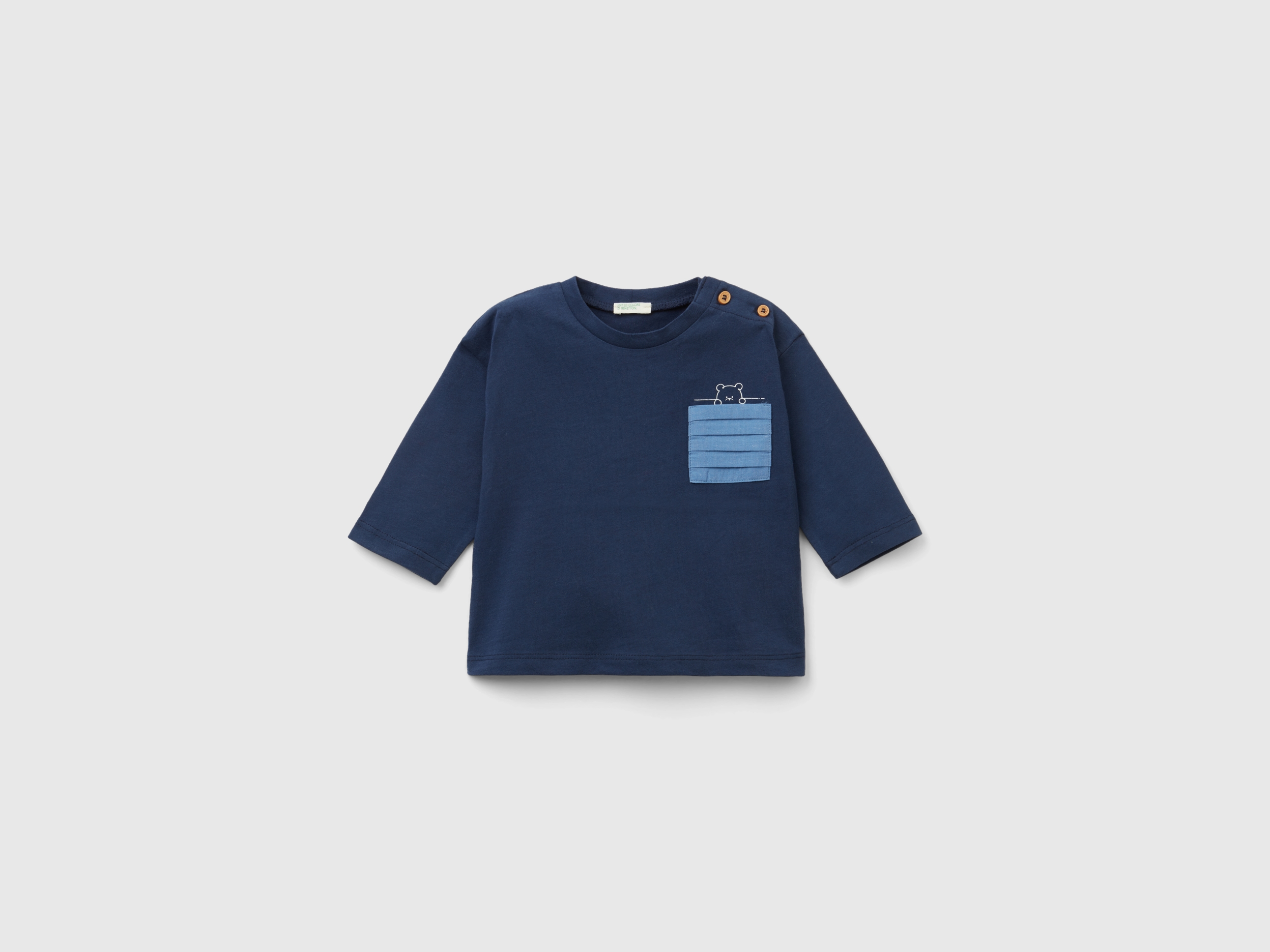 T-shirt à petite poche plissée T-shirt à petite poche plissée