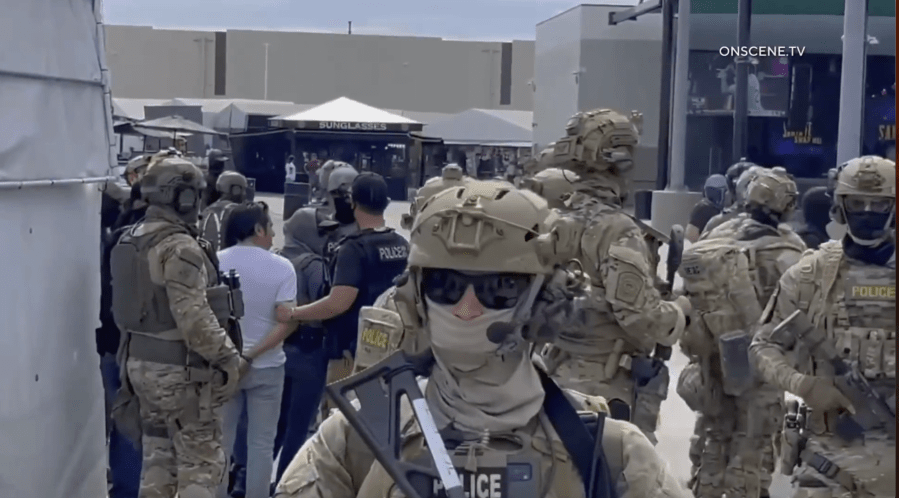 Dozens of closely armed ICE brokers swarm standard L.A. County swap meet Dozens of closely armed ICE brokers swarm standard L.A. County swap meet