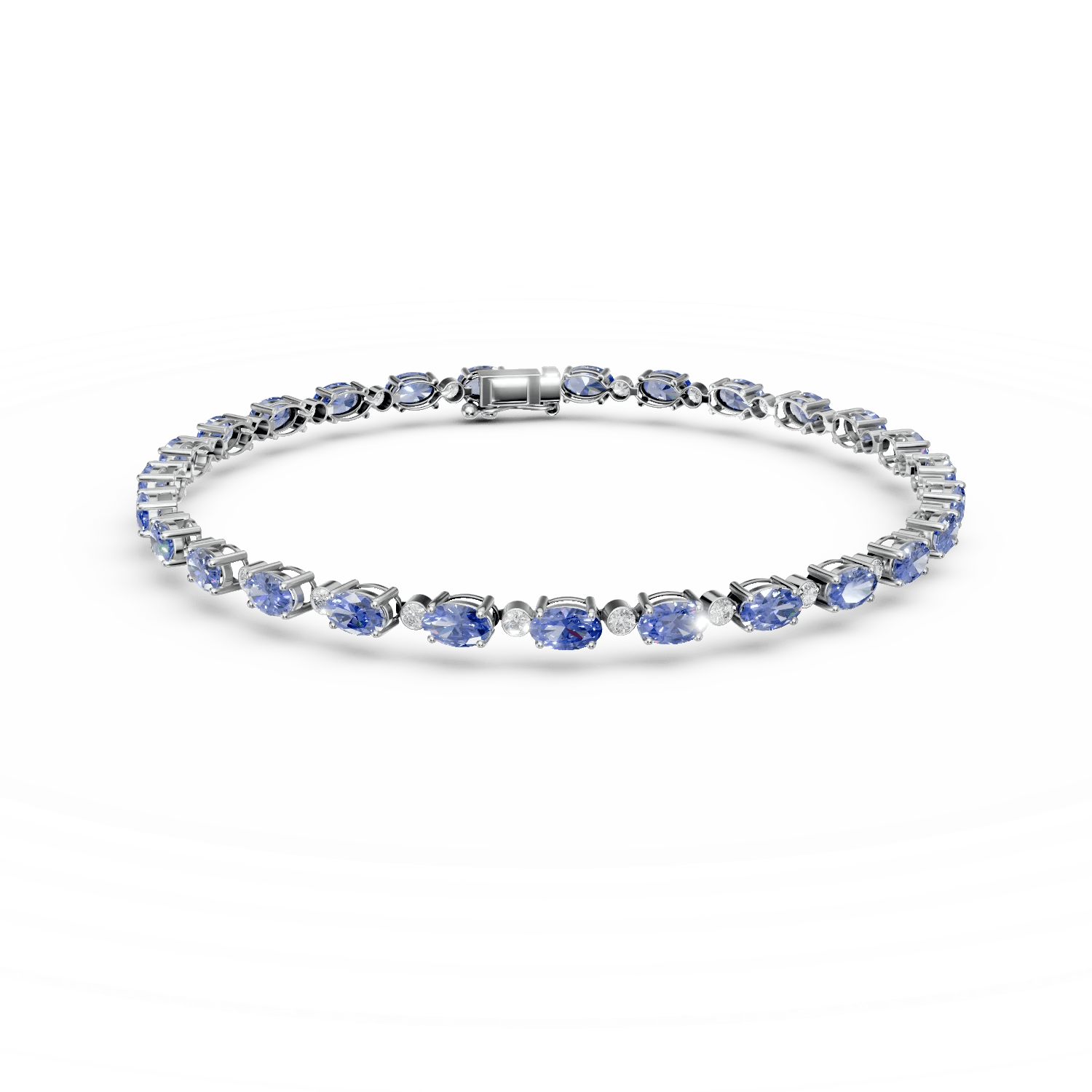 Brățară tennis din aur alb cu tanzanite de 7.3ct și diamante de 0.6ct Brățară tennis din aur alb cu tanzanite de 7.3ct și diamante de 0.6ct