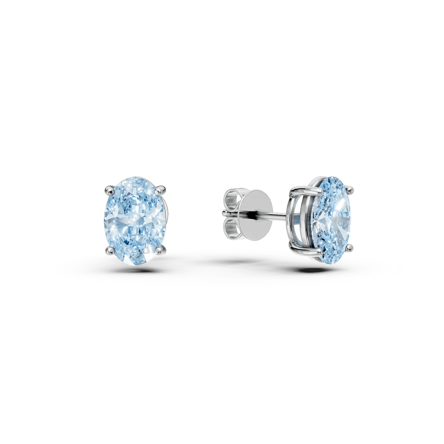 Cercei stud din aur alb cu topaze london blue ovale de 1.1ct Cercei stud din aur alb cu topaze london blue ovale de 1.1ct