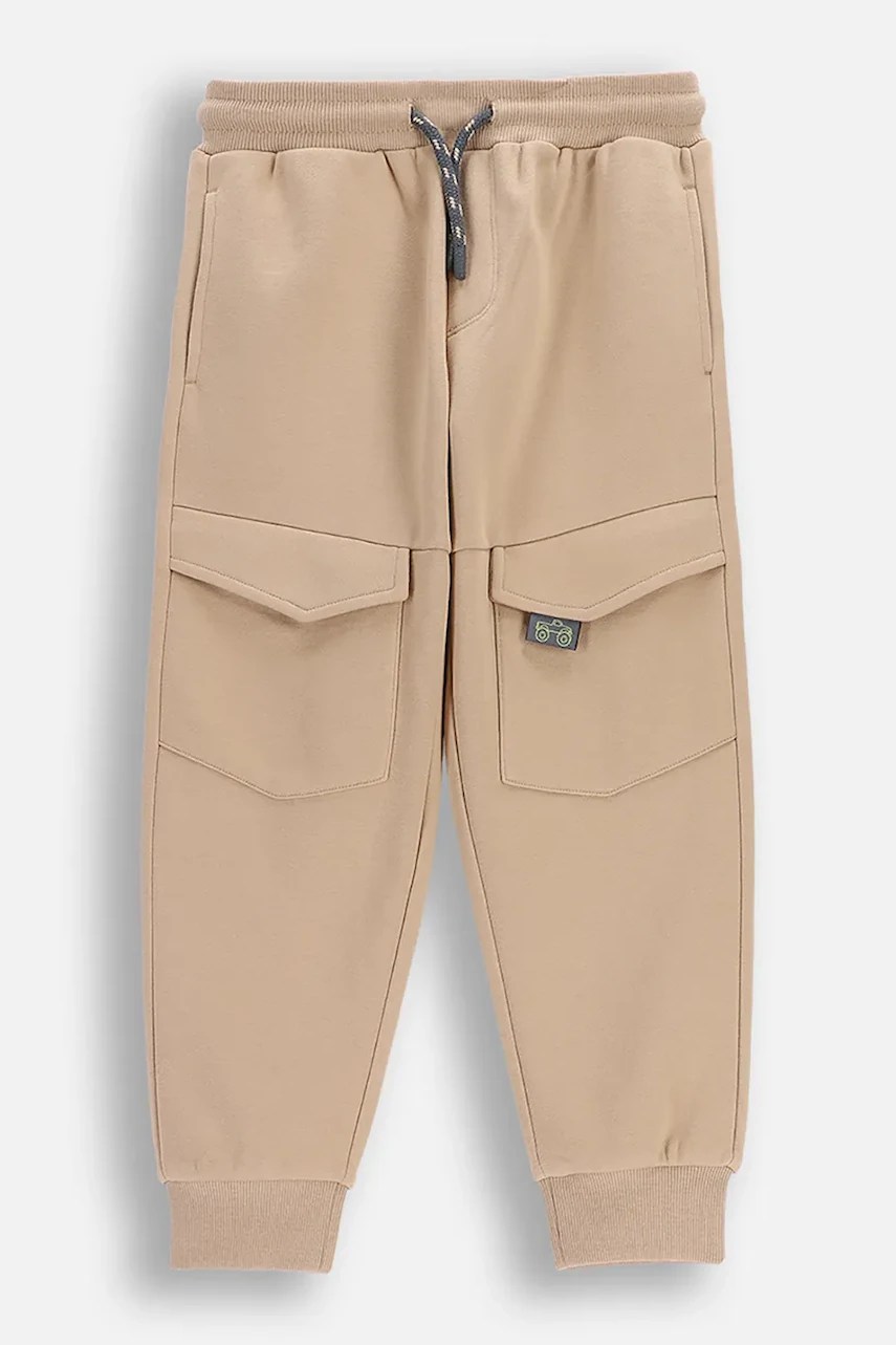 Coccodrillo pantaloni de trening pentru copii din bumbac Coccodrillo pantaloni de trening pentru copii din bumbac