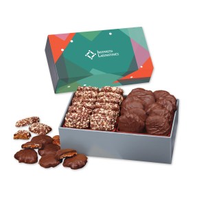 Toffee & Pecan Clusters in Gift Box with Green Geometric Sleeve 1 Toffee & Pecan Clusters in Gift Box with Green Geometric Sleeve 1
