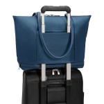 Briggs & Riley® Expandable Tote - 3_PT225X_Navy_Travel_In Use Briggs & Riley® Expandable Tote - 3_PT225X_Navy_Travel_In Use