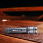 2400 Lumen Aluminum Flashlight - COML124 - flashlight on table 2400 Lumen Aluminum Flashlight - COML124 - flashlight on table