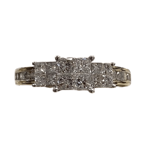 Ladies 14ct Yellow Gold, 4 Princess Cut Diamonds Invisible Set With 4 White Gold Princess Cut Invisible Set Each Side And 5 Round Brilliant Channel Set In Shoulders Each Side. TDW 1.00ct, Size L. With Valuation Certificate.