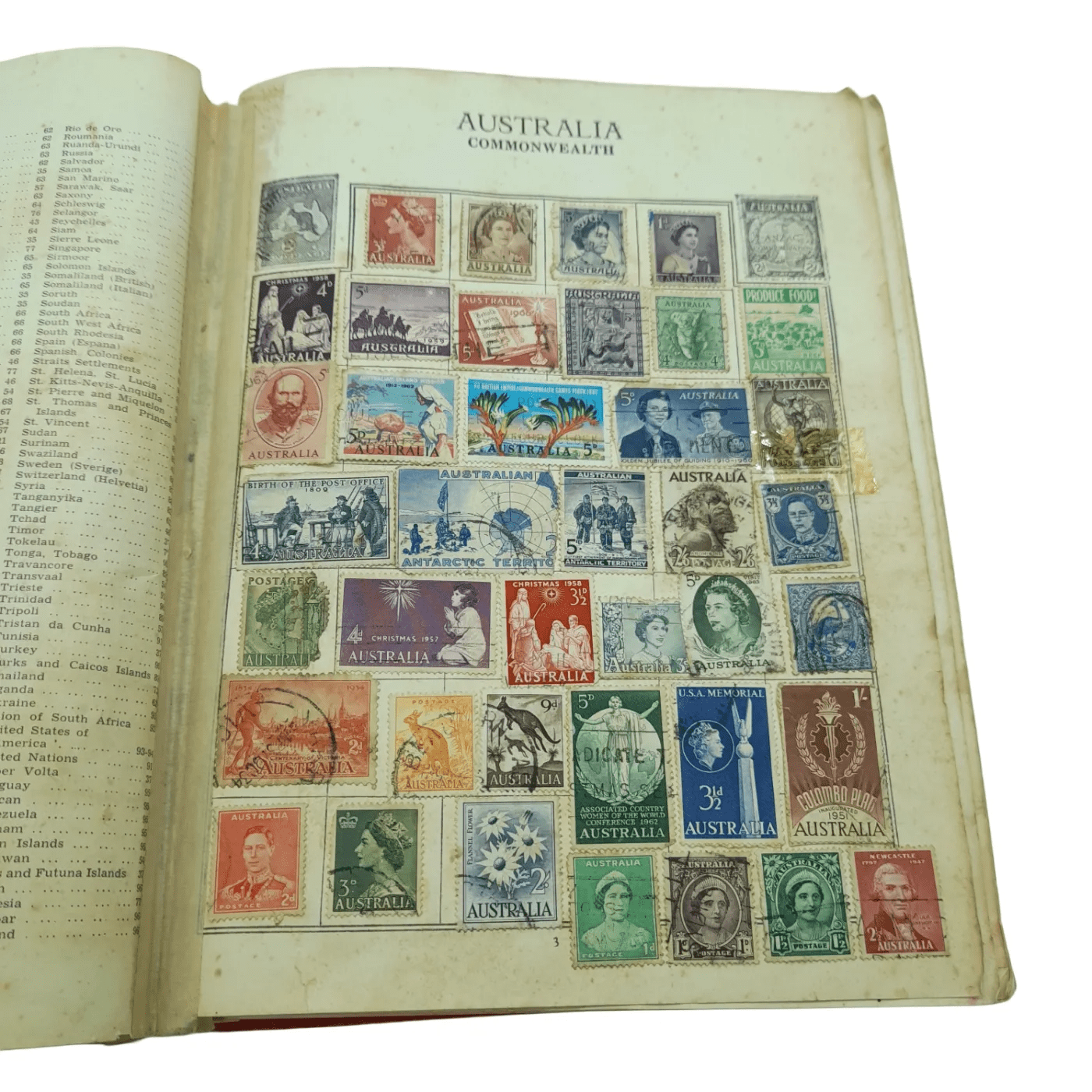 Global Stamp Album Red Book With Stamps From Varying Countries Including: Australia, New Zealand, Bulgaria, Canada, Czech, Denmark, France, UK, Asia, Hungary, Ireland etc (WR 1350167)
