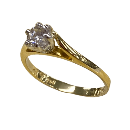 Ladies 18ct Yellow Gold Single Stone Diamond Ring. Round Brilliant Cut Surrounded 6 Claw Wire Tapered Collect Set On a Yellow Gold Under Rail With Pointed Cross Over Swept Up Shoulders. TDW 0.39ct. Size L/5.5, With Valuation Certificate – (NG 102862)