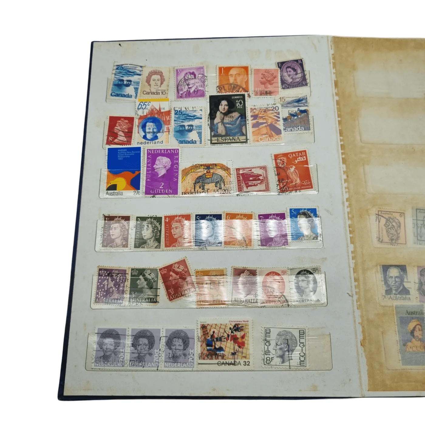 Assorted Global Stamps In Blue Stamp Book (Including: Indonesia, Australia, USA, Nederland)