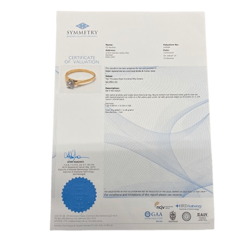 Ladies 18ct Yellow & White Gold Single Stone Diamond Ring. Round Brilliant Cut Diamond White Gold 6 Claw Set With Tapered Pierced Out Collet On Flat Yellow Gold Under Rail With Grooved Swept Up Shoulders. TDW 0.55ct. Size H/4.5, With Valuation Certificate (NG 63624)