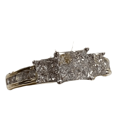 Ladies 14ct Yellow Gold, 4 Princess Cut Diamonds Invisible Set With 4 White Gold Princess Cut Invisible Set Each Side And 5 Round Brilliant Channel Set In Shoulders Each Side. TDW 1.00ct, Size L. With Valuation Certificate.