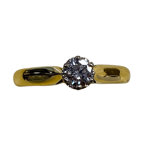 Ladies 18ct White & Yellow Gold Stone Diamond Ring. Single Round Brilliant Cut White Gold 6 Claw Set With Tapered Scroll Pierced Out Collet With Pointed Swept Up Shoulders. TDW 0.31ct. Size M/6.5, With Valuation Certificate (NG 99365)