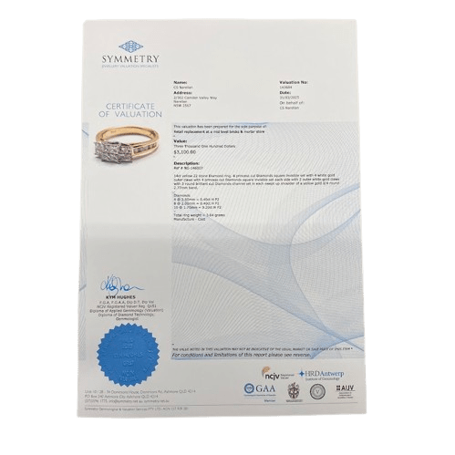 Ladies 14ct Yellow Gold, 4 Princess Cut Diamonds Invisible Set With 4 White Gold Princess Cut Invisible Set Each Side And 5 Round Brilliant Channel Set In Shoulders Each Side. TDW 1.00ct, Size L. With Valuation Certificate.