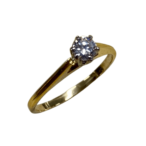Ladies 18ct Yellow & White Gold Single Stone Diamond Ring. Round Brilliant Cut Diamond White Gold 6 Claw Set With Tapered Pierced Out Collet On Flat Yellow Gold Under Rail With Grooved Swept Up Shoulders. TDW 0.55ct. Size H/4.5, With Valuation Certificate (NG 63624)