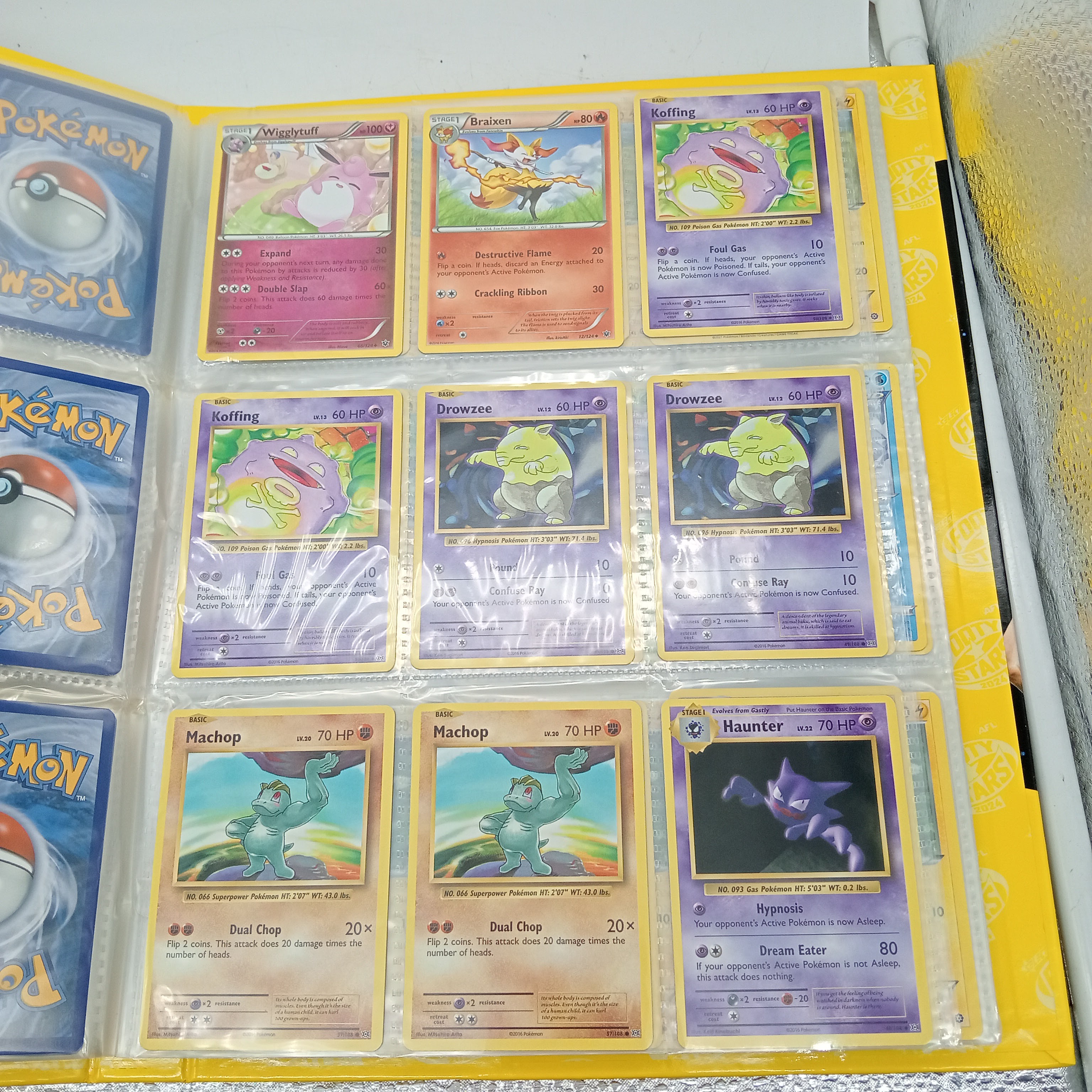 Estimated 170 Assorted Pokemon Cards In AFL Album Includes: Holo, Reverse Holo, Common, Trainer Cards (WR 1343495)