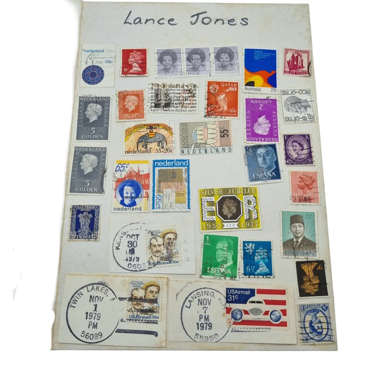 Assorted Global Stamps In Blue Stamp Book (Including: Indonesia, Australia, USA, Nederland)