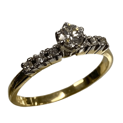 Ladies 18ct Yellow & White Gold Diamond Ring. Single Round 0.20ct Brilliant Cut White Gold Claw Set Diamond, With 6 Round Brilliant Cut White Gold Claw Set Diamonds. TDW 0.29ct. Size L&1/2 . With Valuation Certificate.