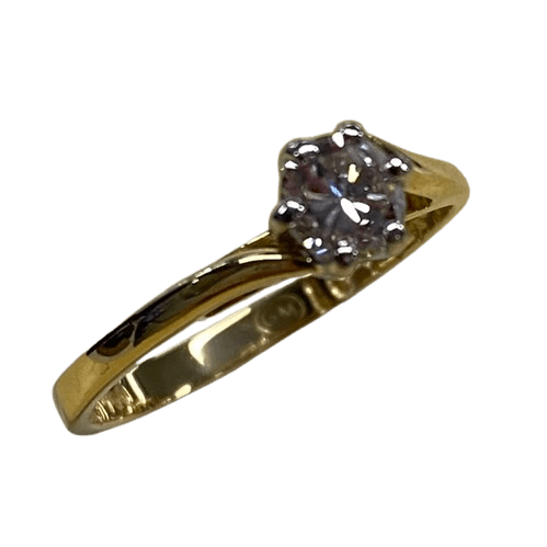 Ladies 18ct Yellow Gold Single Stone Diamond Ring. Round Brilliant Cut Surrounded 6 Claw Wire Tapered Collect Set On a Yellow Gold Under Rail With Pointed Cross Over Swept Up Shoulders. TDW 0.39ct. Size L/5.5, With Valuation Certificate – (NG 102862)