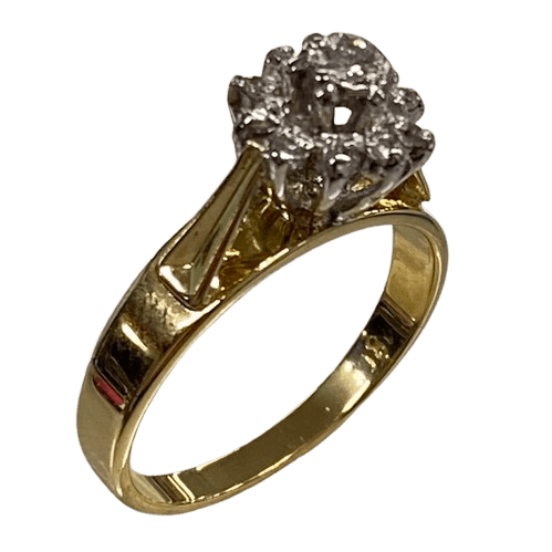 Ladies 18ct Yellow & White Gold Diamond Cluster Ring. Single Round 0.06ct Brilliant Cut White Gold Claw Set Diamond, With 10 Round Brilliant Cut White Gold Illusion Grain Set Diamonds. TDW 0.16ct. Size L&1/2 . With Valuation Certificate.