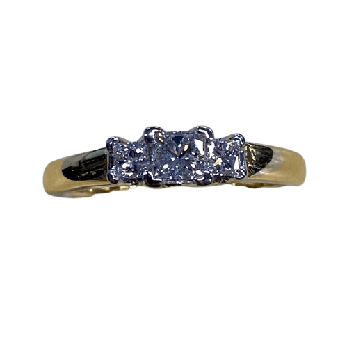Ladies 18ct Yellow & White Gold 3 Stone Diamond Ring. 3 Princess Cut Diamonds White Gold Corner Cap Set With V Style Gallery Solid Swept Up Shoulders On Yellow Gold Tapered Band. TDW 0.51ct. Size N/7, With Valuation Certificate (NG 1305744)