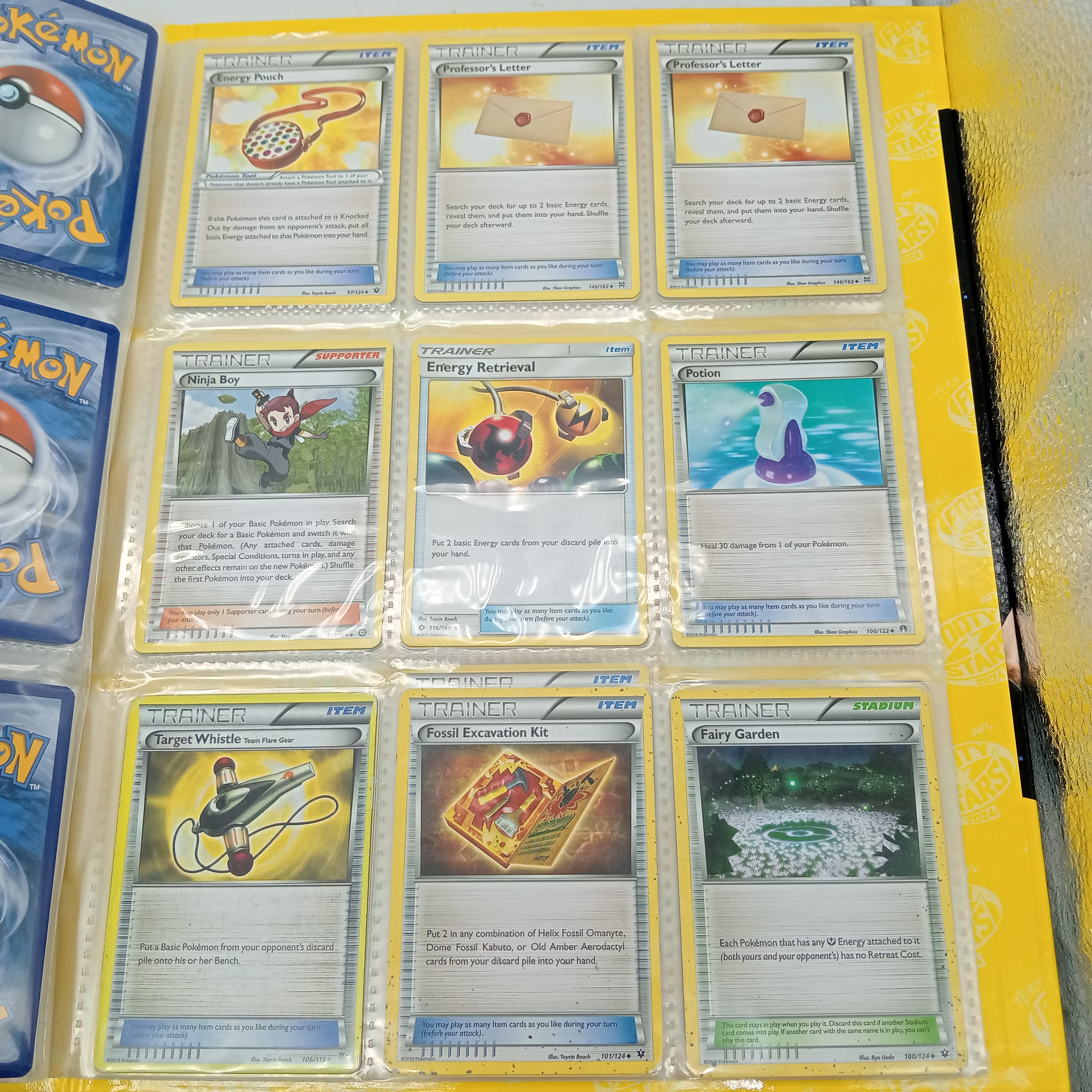 Estimated 170 Assorted Pokemon Cards In AFL Album Includes: Holo, Reverse Holo, Common, Trainer Cards (WR 1343495)