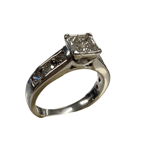 Ladies 14ct White Gold 10 Stone Diamond Ring. 4 Princess Cut Square Invisible Diamonds. With 6 Round Brilliant Cut Diamonds Channel Set Stones Set in Swept Up Shoulders. TDW 1.30ct. Size N/7 . With Valuation Certificate – (NG 143712)