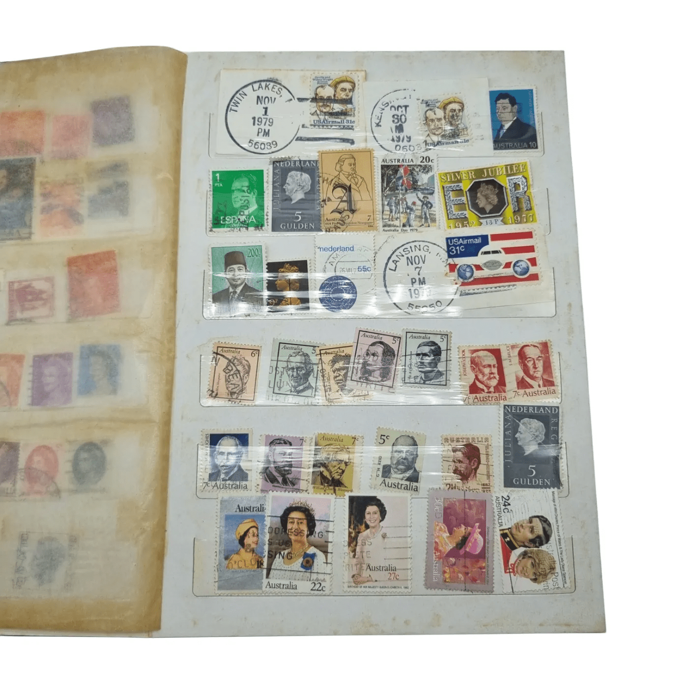 Assorted Global Stamps In Blue Stamp Book (Including: Indonesia, Australia, USA, Nederland)