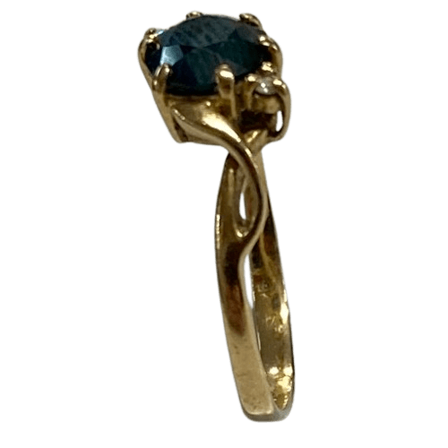Ladies 9ct Yellow Gold Accent Ring Crossover Detailing with Blue Centre Sone. Size 6