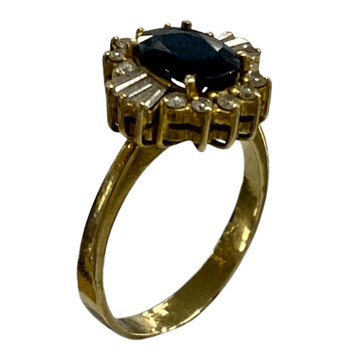 Ladies 9ct Yellow Gold 1.70ct Oval Australian Dark Blue Sapphire Ring, With 12 Surrounded with Round Brilliant and 6 Baggett Diamond. TDW 0.36ct & 1.07ct Sapphire. With Valuation Certificate.