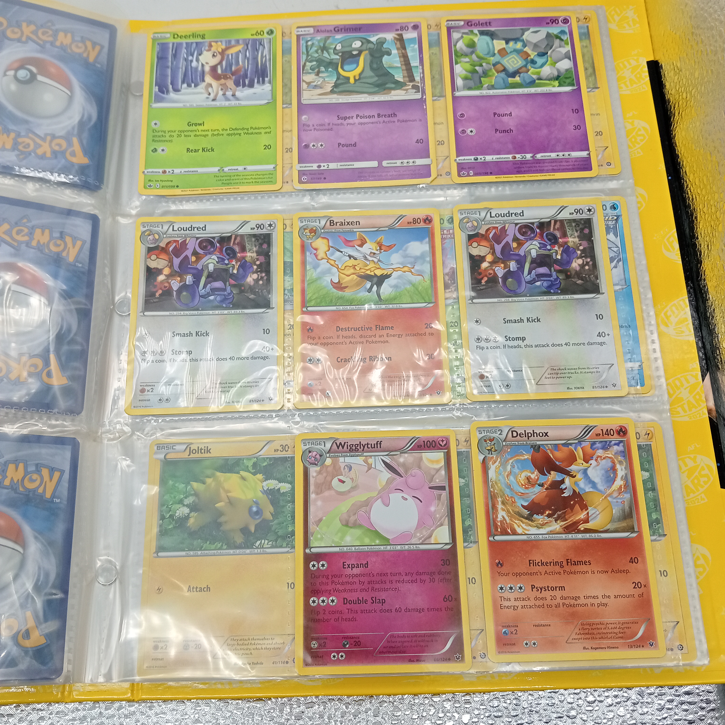 Estimated 170 Assorted Pokemon Cards In AFL Album Includes: Holo, Reverse Holo, Common, Trainer Cards (WR 1343495)