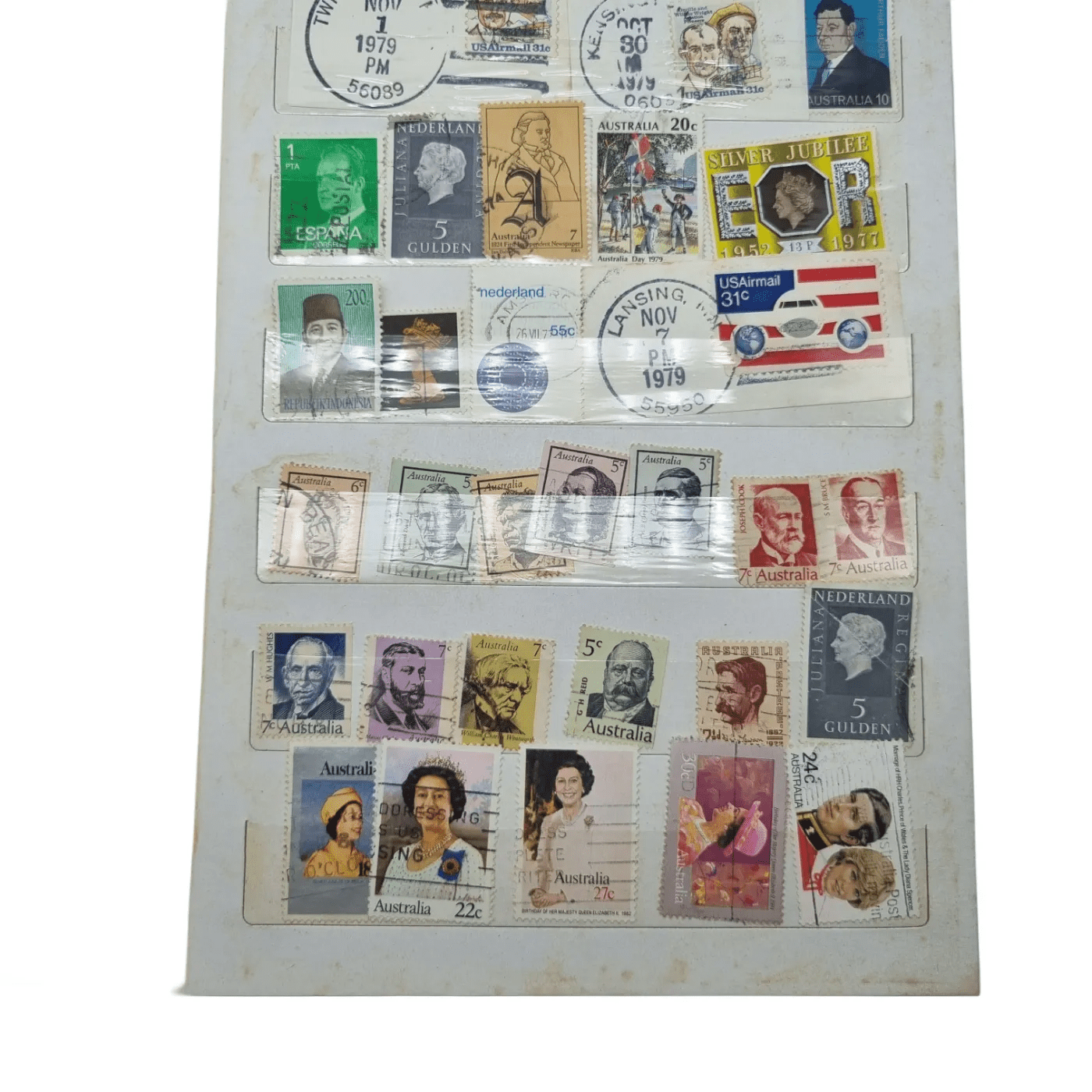 Assorted Global Stamps In Blue Stamp Book (Including: Indonesia, Australia, USA, Nederland)