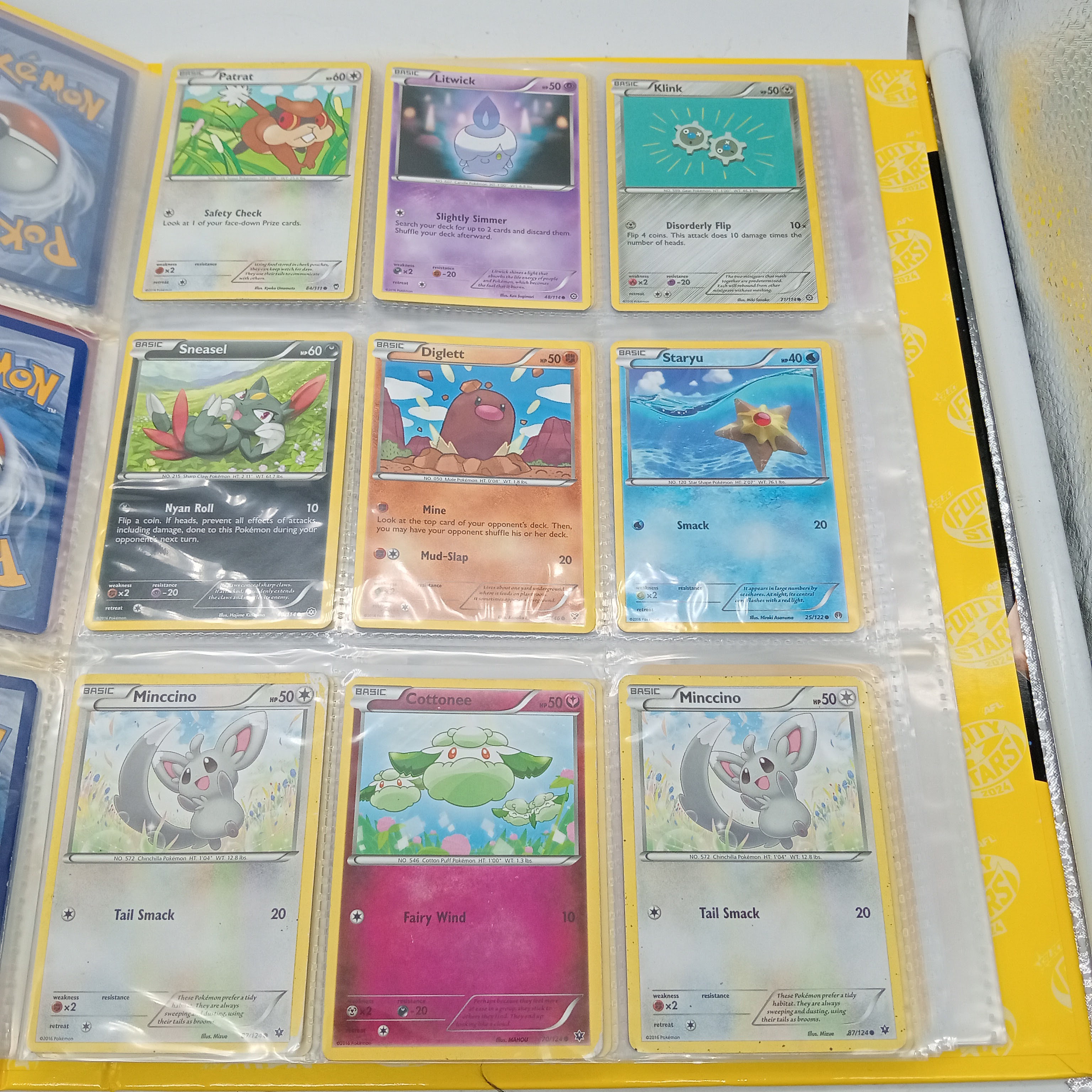 Estimated 125 Assorted Pokemon Cards In AFL Album Includes:  Common & Energy Cards (WR 1343495)