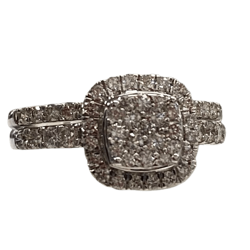 Ladies 18ct White Gold Diamond Cluster with 29 Stone. 17 Round Brilliant Cut Diamonds in Squared Shared Claw Settings, Surrounded by 20 Round Brilliant Cut Claw Set with 4 Round Brilliant Cut Claw Set in Shoulders, With 14 Round Brilliant Cut Diamonds In Claw Set Fitted Band. TDW 1.00ct. Size O. With Valuation Certificate.