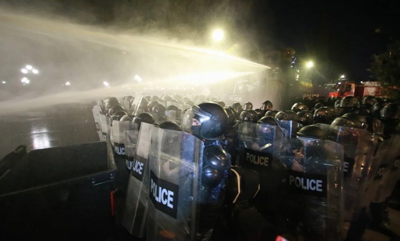 Georgia’s police use water cannons to push back protesters trying to storm presidential palace Georgia’s police use water cannons to push back protesters trying to storm presidential palace