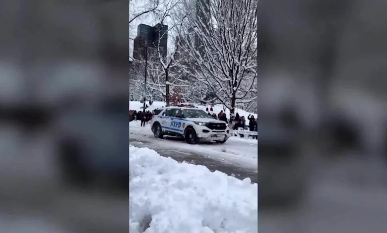 NYPD vehicle pelted with snowballs after blizzard hits New York NYPD vehicle pelted with snowballs after blizzard hits New York