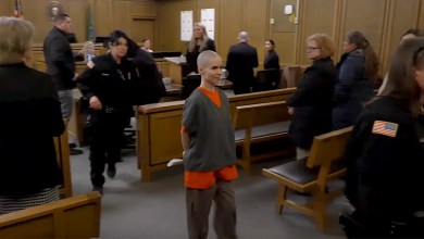 Bald-headed killer smiles as prosecutors reveal what she did before dad walked in Bald-headed killer smiles as prosecutors reveal what she did before dad walked in