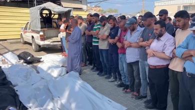 Funerals held for 14 people as hospital officials in central Gaza say 11 killed in an airstrike Funerals held for 14 people as hospital officials in central Gaza say 11 killed in an airstrike