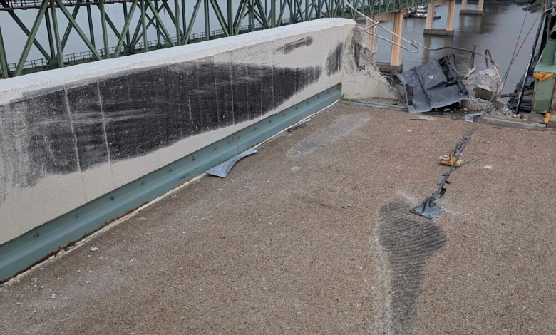 Truck smashes through barrier and plunges off a bridge into the Delaware River Truck smashes through barrier and plunges off a bridge into the Delaware River