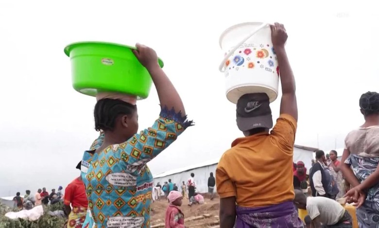 Burundi 'overwhelmed' as tens of thousands flee eastern Congo Burundi 'overwhelmed' as tens of thousands flee eastern Congo