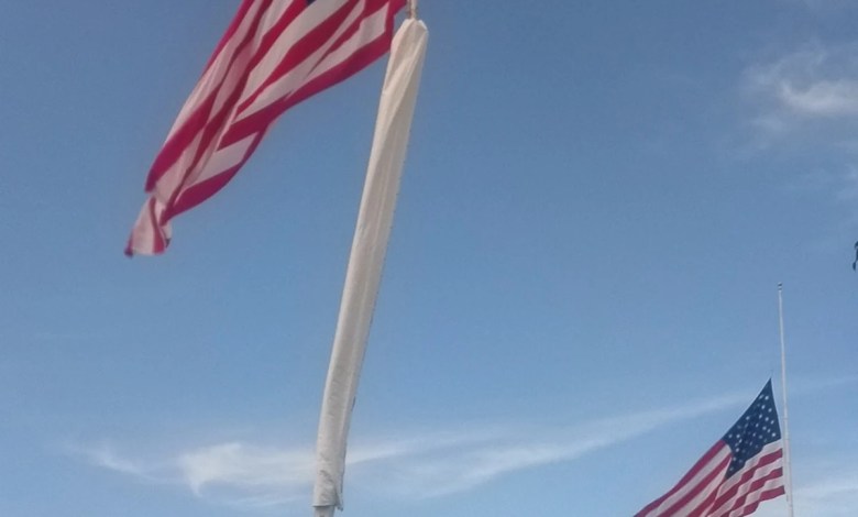 Why are 2 giant American flags flying over Interstate 5 in Redding? Why are 2 giant American flags flying over Interstate 5 in Redding?