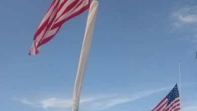 Why are 2 giant American flags flying over Interstate 5 in Redding? Why are 2 giant American flags flying over Interstate 5 in Redding?