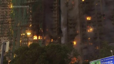 Four people killed by raging fire at high-rise Hong Kong housing complex Four people killed by raging fire at high-rise Hong Kong housing complex