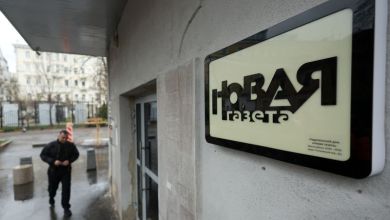 Masked security agents raid Russian newspaper in Moscow and arrest journalist Masked security agents raid Russian newspaper in Moscow and arrest journalist