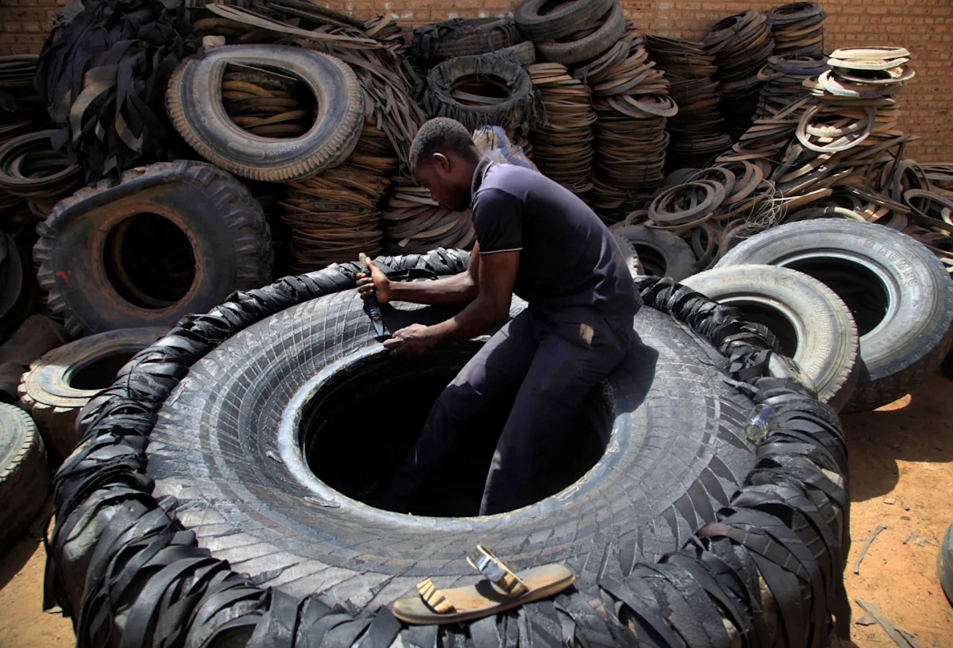 As the going gets tough in South Sudan, some artisans offer cheap footwear made from rubber tires As the going gets tough in South Sudan, some artisans offer cheap footwear made from rubber tires