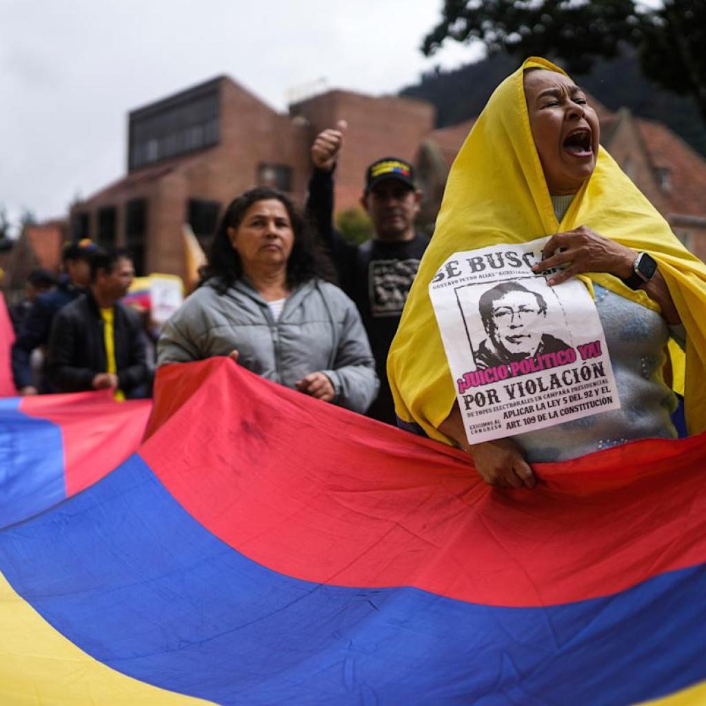 Thousands of Colombians take to the streets to reject proposed reforms and rebuke the president Thousands of Colombians take to the streets to reject proposed reforms and rebuke the president