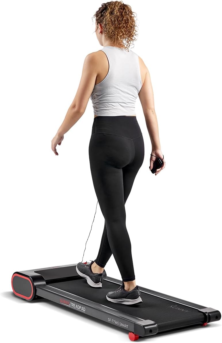 Sunny Health & Fitness Slim Under Desk Walking Compact Treadpad Treadmill with Remote Control, Digital Display, Shock Absorption, Optional Trekking Poles, Free SunnyFit App Bluetooth Connectivity Sunny Health & Fitness Slim Under Desk Walking Compact Treadpad Treadmill with Remote Control, Digital Display, Shock Absorption, Optional Trekking Poles, Free SunnyFit App Bluetooth Connectivity