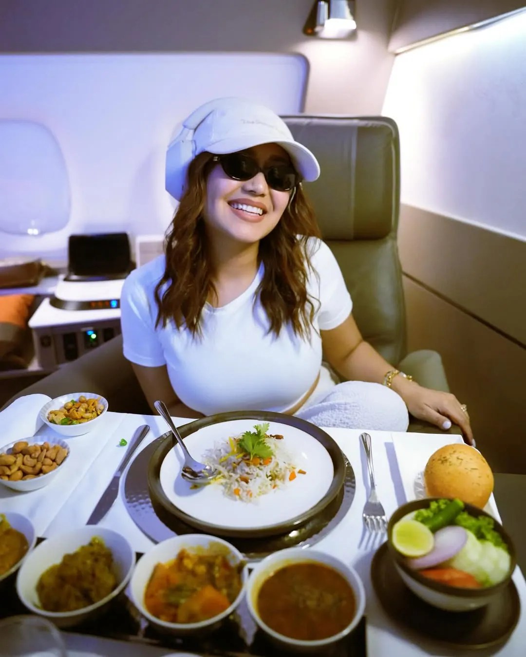Neha Kakkar Enjoys Lavish In-Flight Meal Before Landing In Australia Neha Kakkar Enjoys Lavish In-Flight Meal Before Landing In Australia