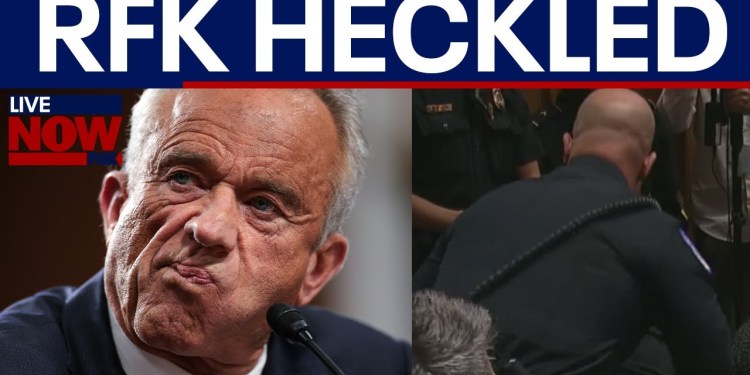 RFK. Jr. heckled during senate hearing “You’re killing millions” RFK. Jr. heckled during senate hearing “You’re killing millions”