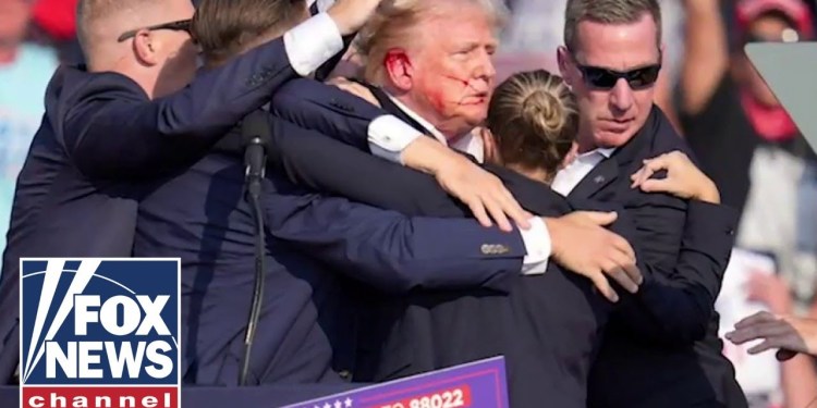 Bloodied Trump rushed off stage after shots fired at rally Bloodied Trump rushed off stage after shots fired at rally